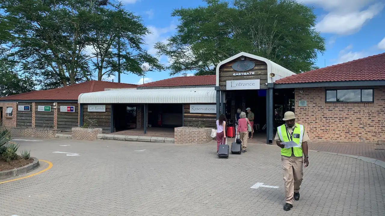 Guests using the Hoedspruit Airport main entrance to leave onward to their next destination.
